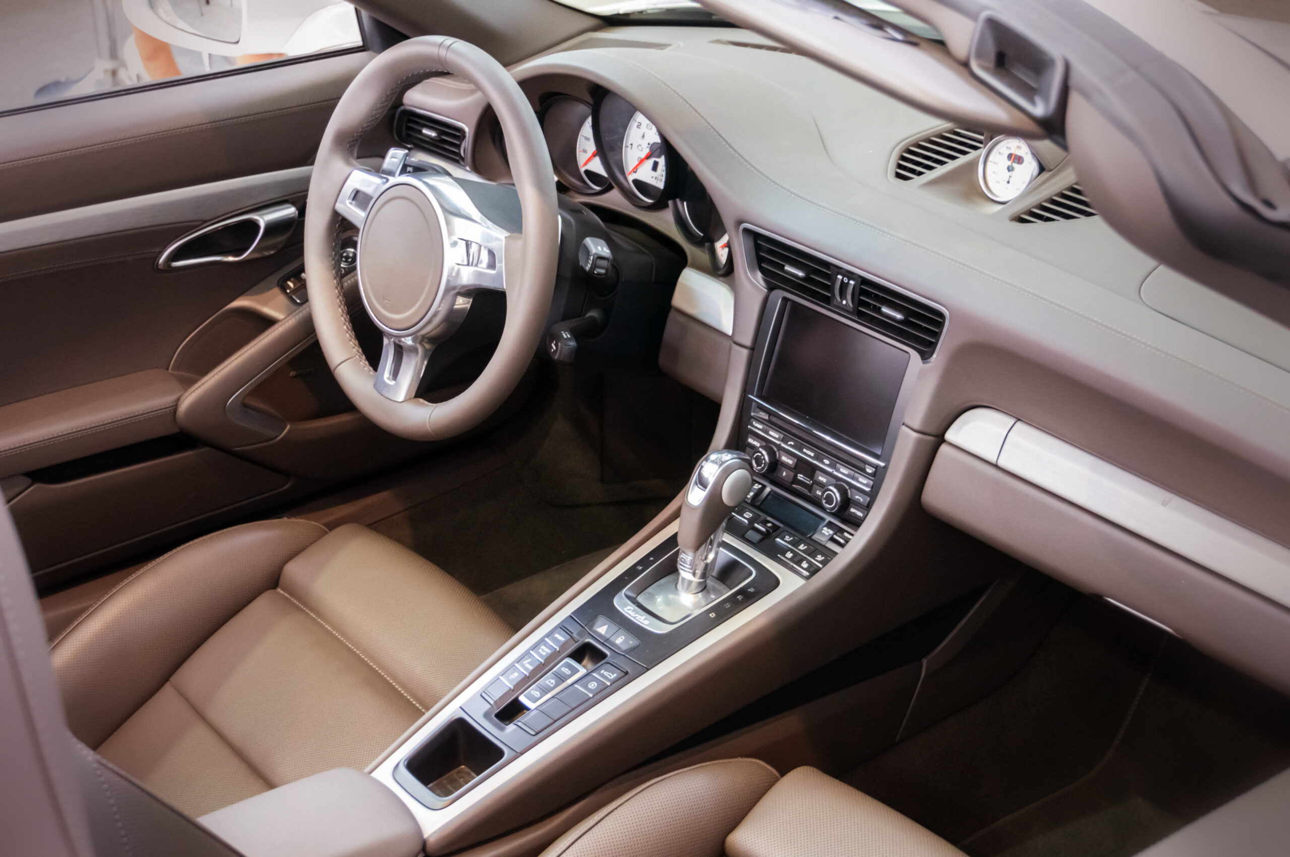 Dark,Luxury,Car,Interior,-,Steering,Wheel,,Shift,Lever,And